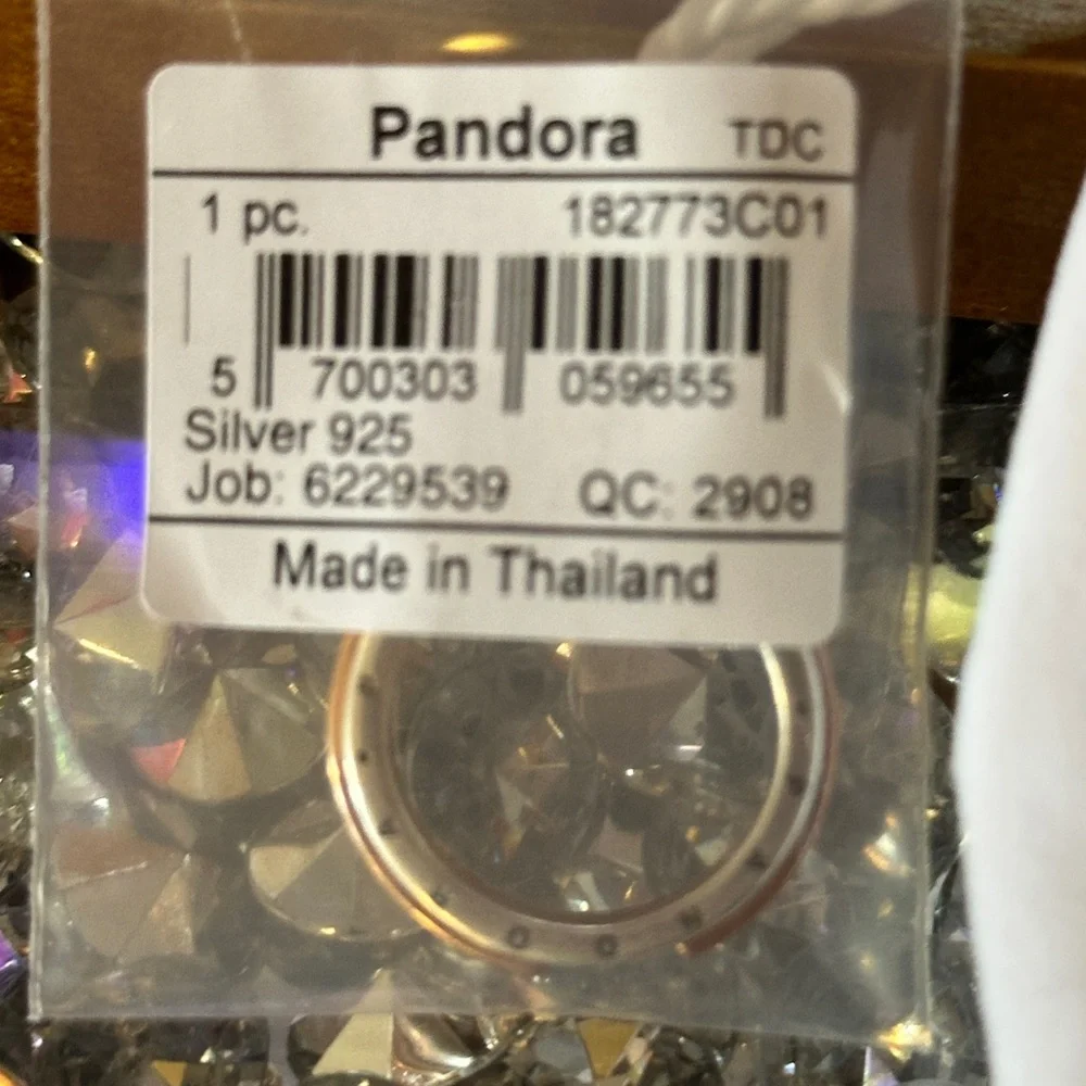 NWT - Pandora Signature Two Tone Logo & Pave Ring. Retail $135.00. Size 6.5